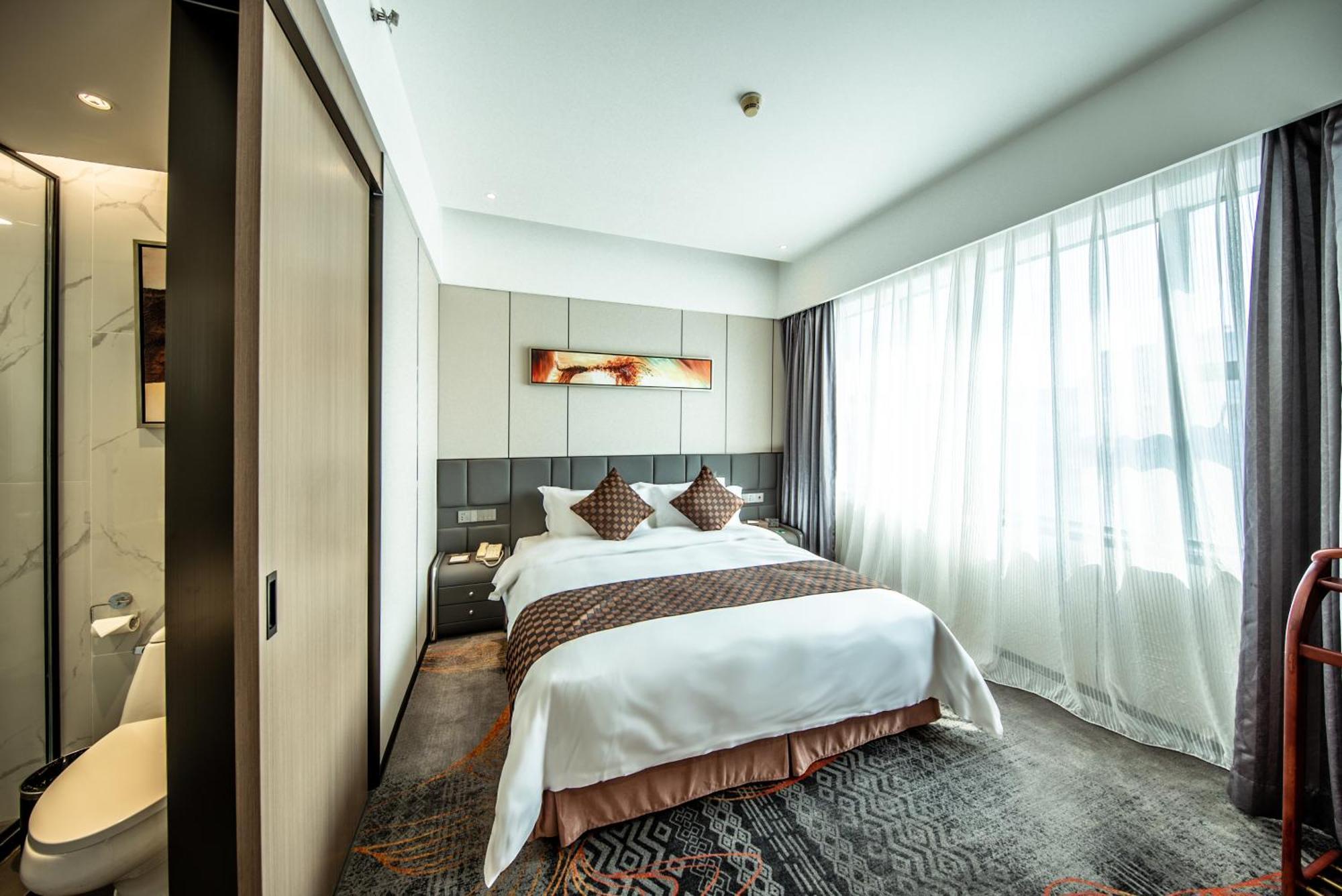 Romanjoy International Hotel Шънджън Екстериор снимка