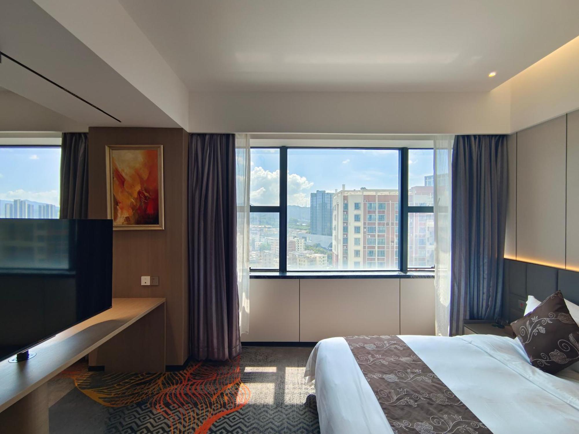 Romanjoy International Hotel Шънджън Екстериор снимка
